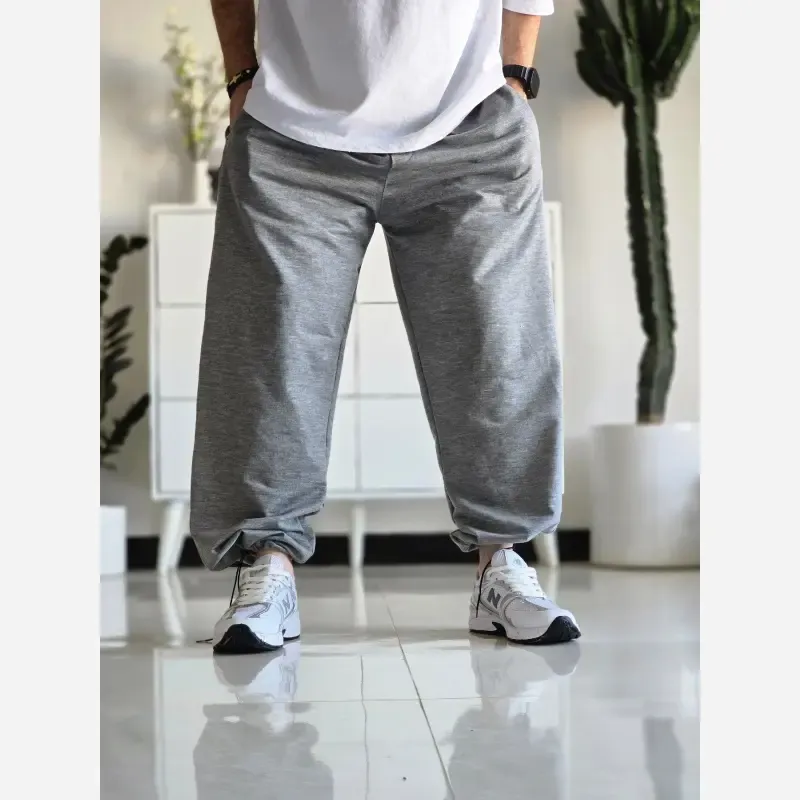 شلوار جاگر کلوین کلین پارچه ملانژ کمر کش دمپا گت دار طوسی مشکی برفی XXL XXXL
